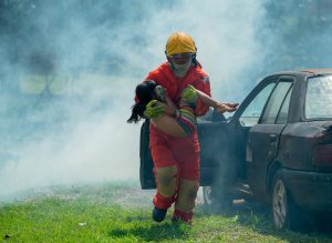 firefighter-help-to-carry-little-asian-girl-or-chi-2025-03-07-20-57-11-utc-min