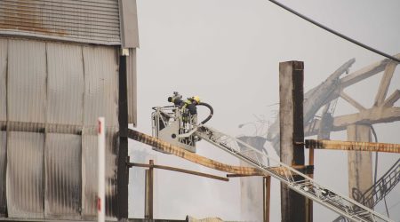 professionals helping to restore house after fire incident