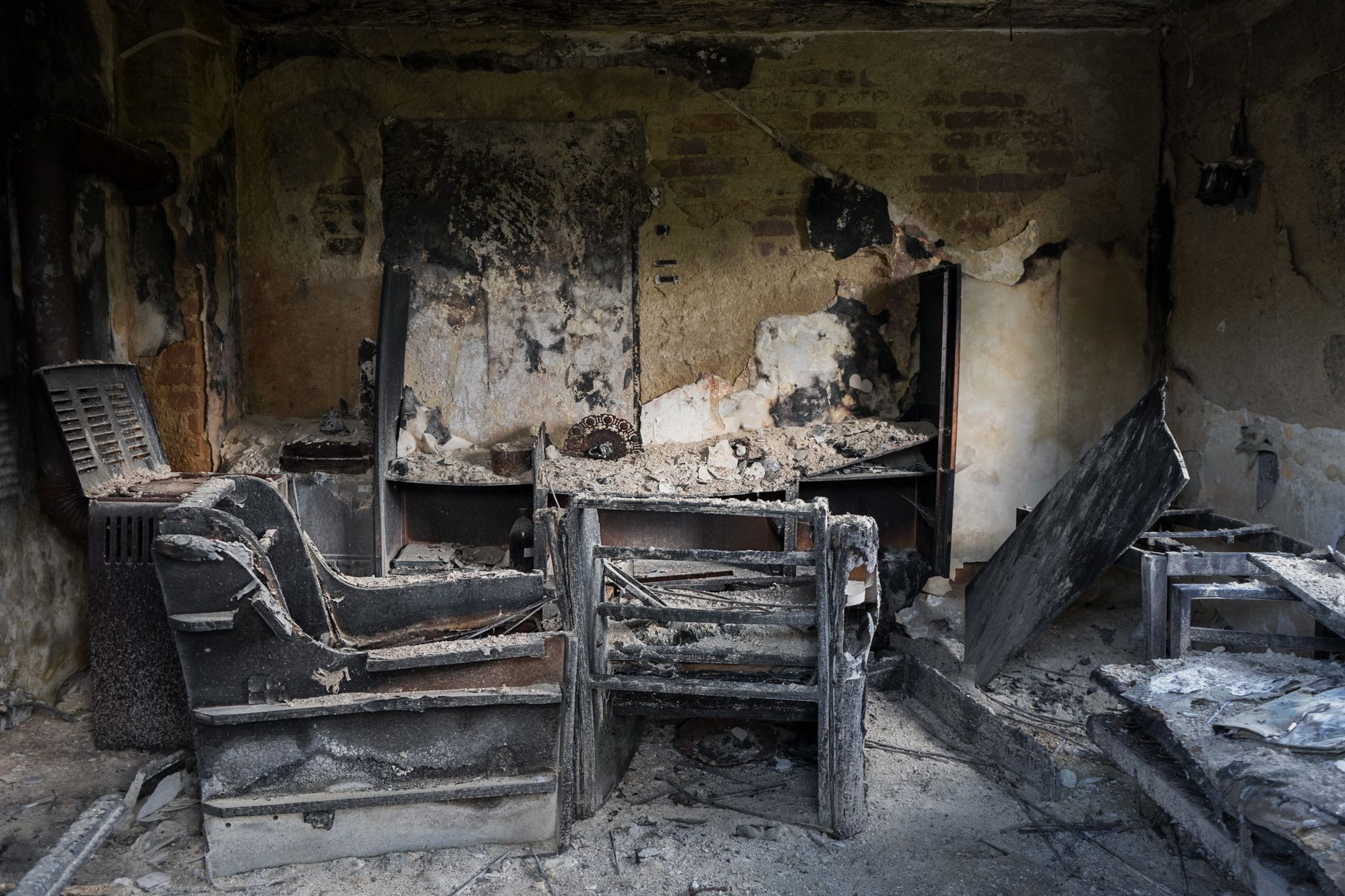 Soot and smoke damage staining the wall of a fire-damaged New Orleans home