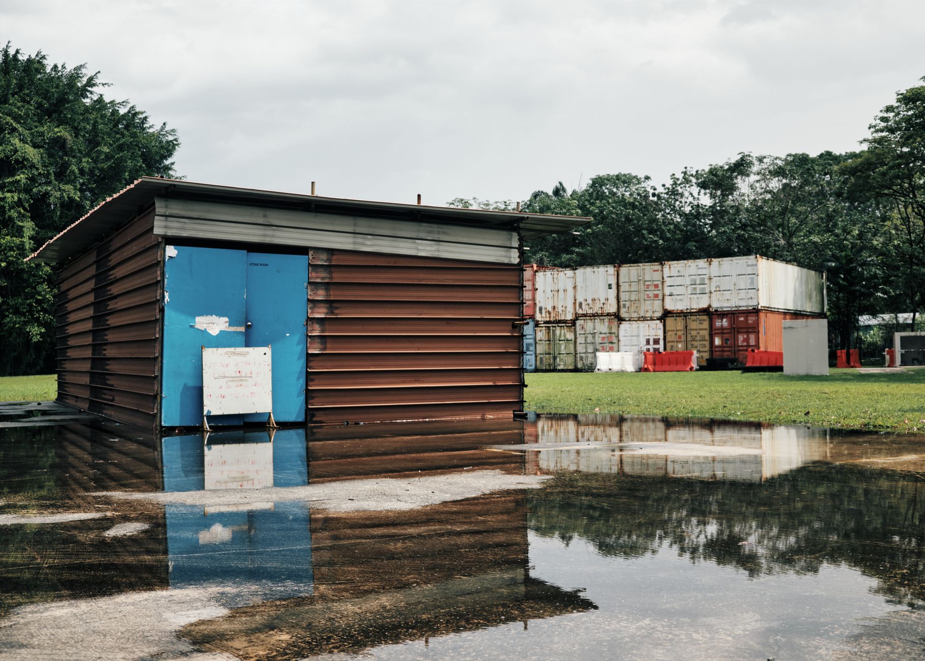 Standing water across a flooded commercial building interior in New Orleans