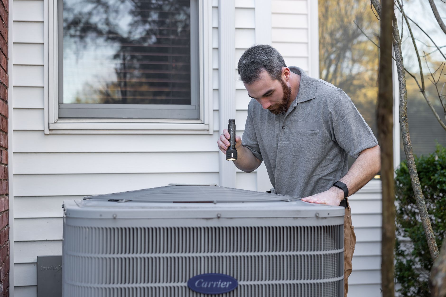 Replacing an HVAC air filter as part of home air duct maintenance